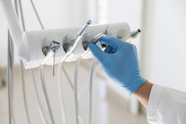 Professional Tooth Extraction technician working in Agua Dulce, TX
